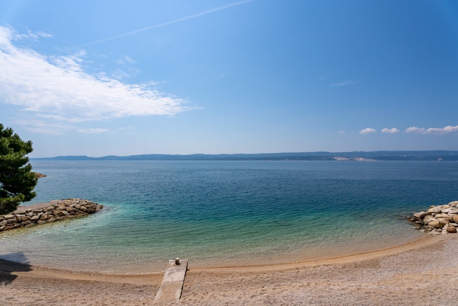 You are located directly on the pebble beach and you can walk by the sea and find your perfect spot