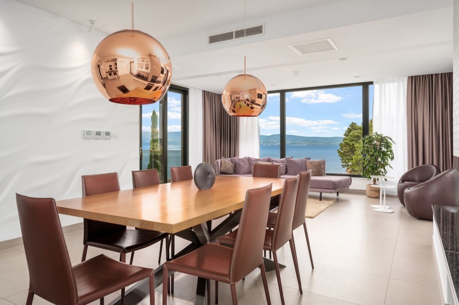 Fully equipped kitchen with exit to outdoor dining area and playground