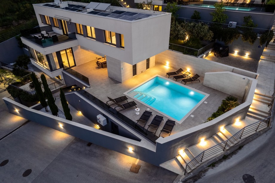 enjoying an al fresco barbecue of local seafood under the stars in the warm even