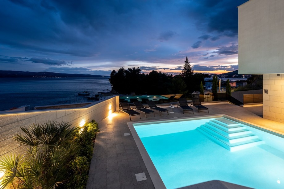 enjoying an al fresco barbecue of local seafood under the stars in the warm even