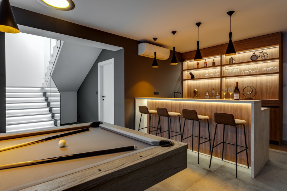 Man cave with billiards and bar