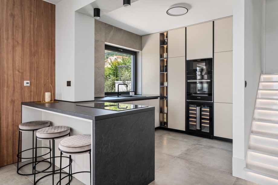 Villa with a chick tone, contemporary architecture, and high-quality furnishings.