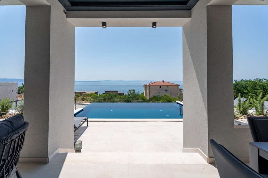 There is a secured parking place on a private plot for 3 cars and a car is recommended.