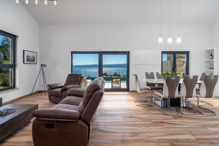 The spacious living and dining area is on the ground floor