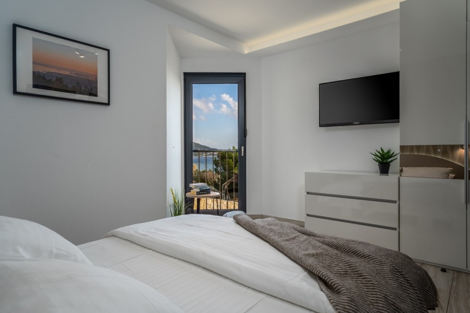 Bedroom No1 with double bed, en-suite and sea views, TV,AC -first floor