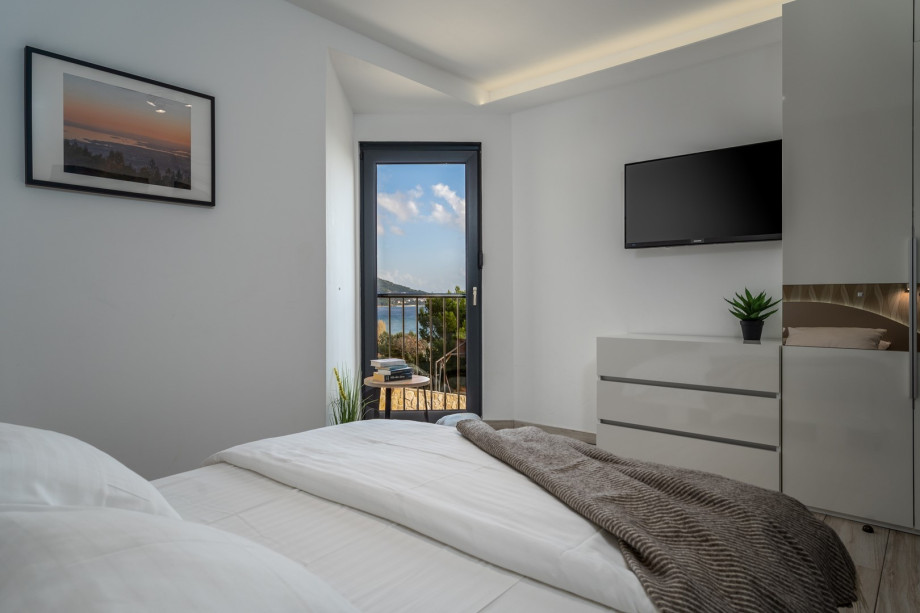 Bedroom No1 with double bed, en-suite and sea views, TV,AC -first floor
