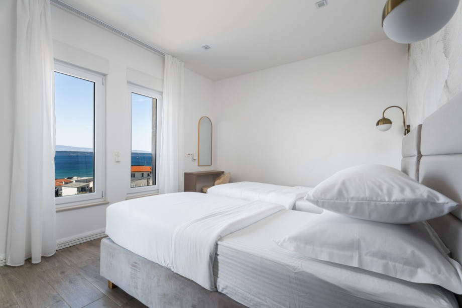 Bedroom No2 with two single beds 90x200cm, en-suite bathroom and terrace