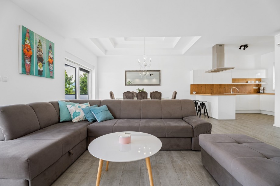 The ground floor consists of a very comfortable, air-conditioned living room with sofa