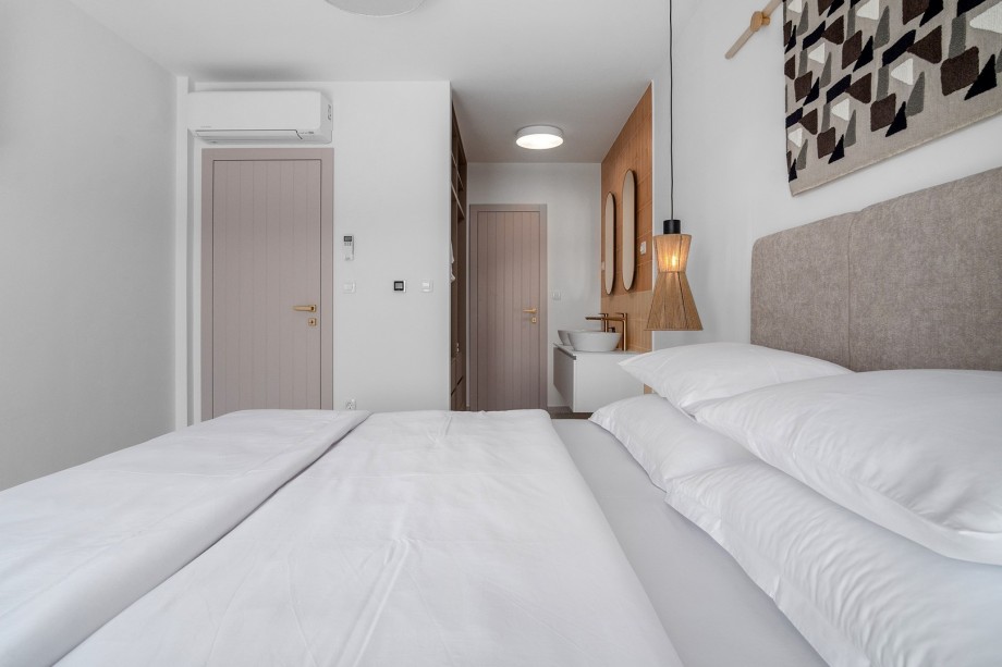 a balcony, and views of the sea and the pool