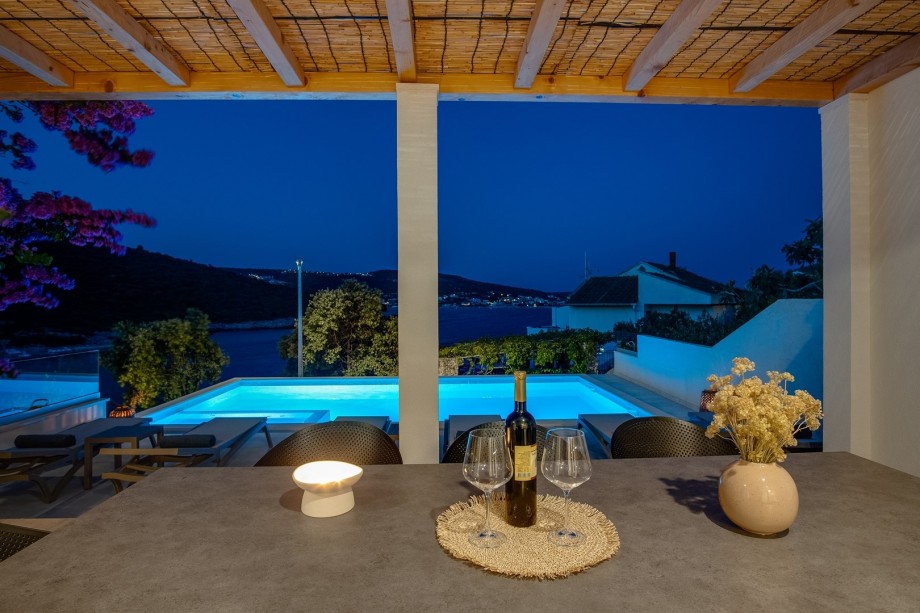 a private swimming pool with hydromassage