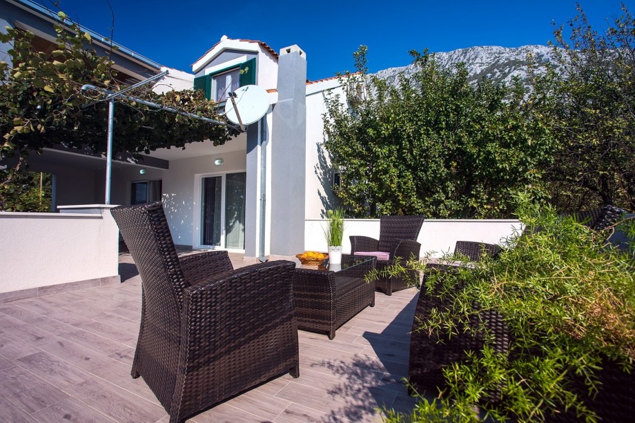 Spacious terrace with lounge and dining area