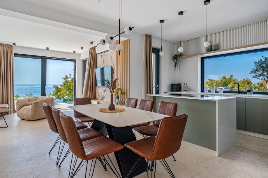 Direct exit to the outdoor dining area and pool