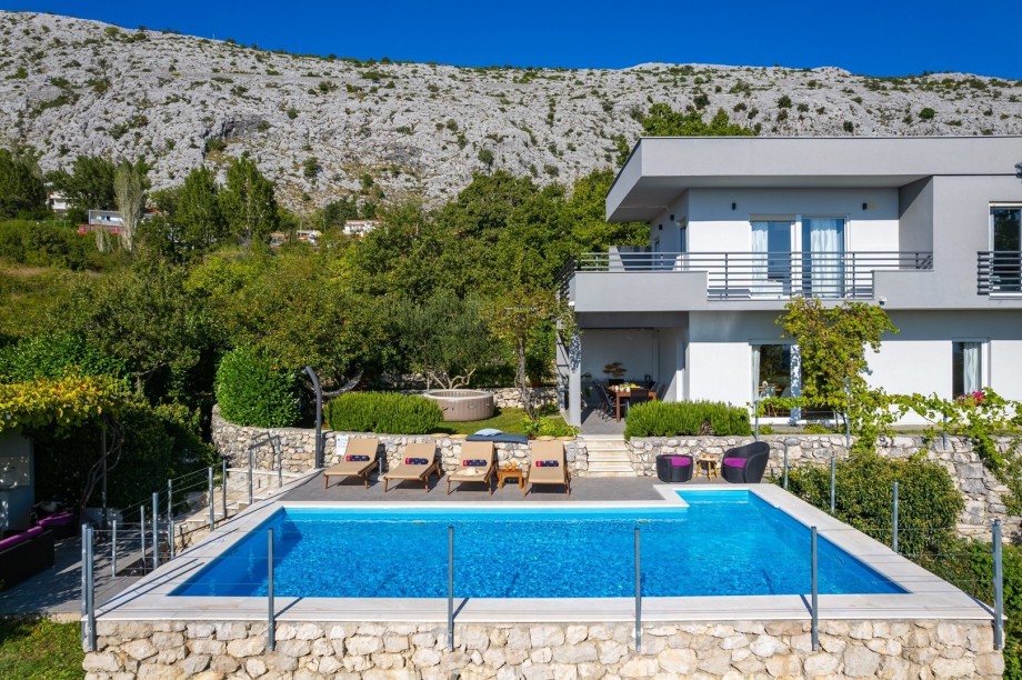 Playground with a Trampoline, a swing, a slide, a see-saw