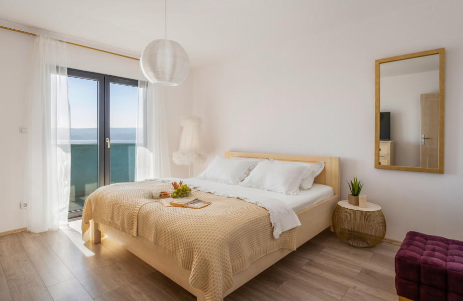 Bedroom No.1 with double bed, terrace, and en-suite bathroom