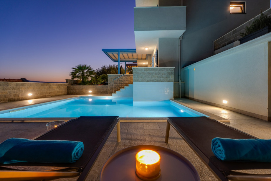 Carefully placed lighting completes the perfect experience of summer evenings