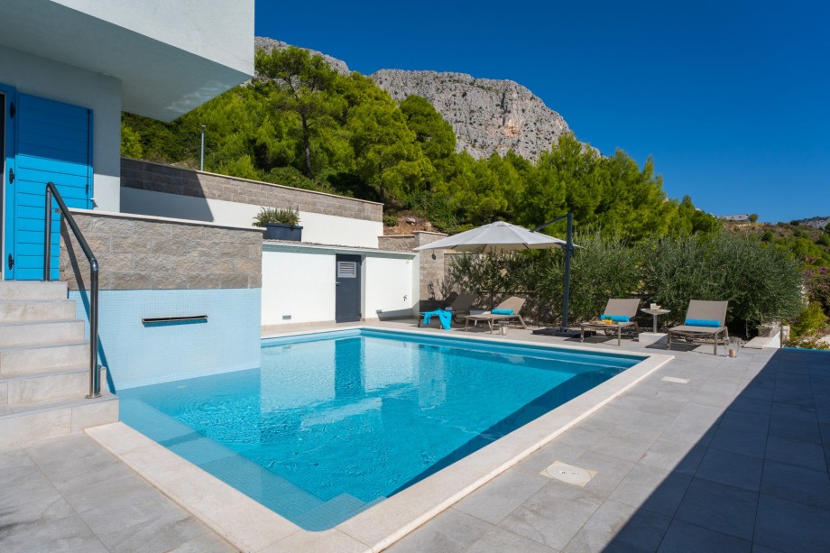Private heated pool with waterfall