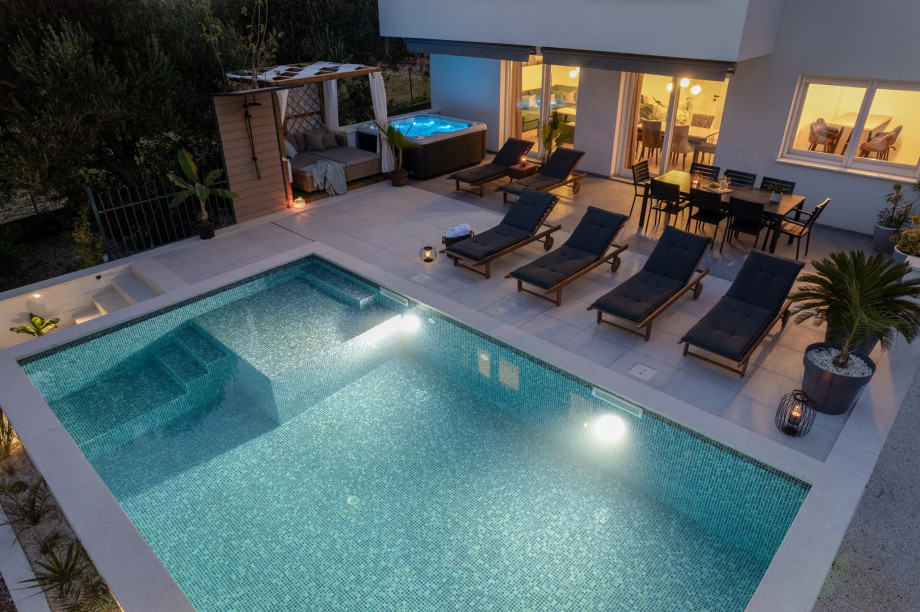 Enjoy evenings at pool area with carefully selected lights around