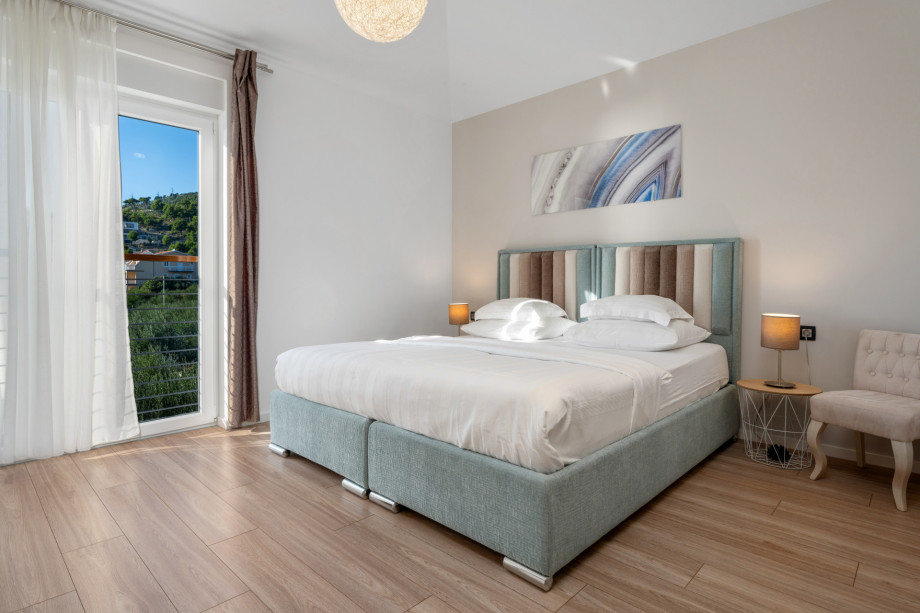 Bedroom No2 with king-size bed 180cm x 200cm, A/C, en-suite bathroom with shower