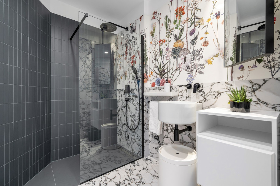 a family bathroom with a shower on the ground floor