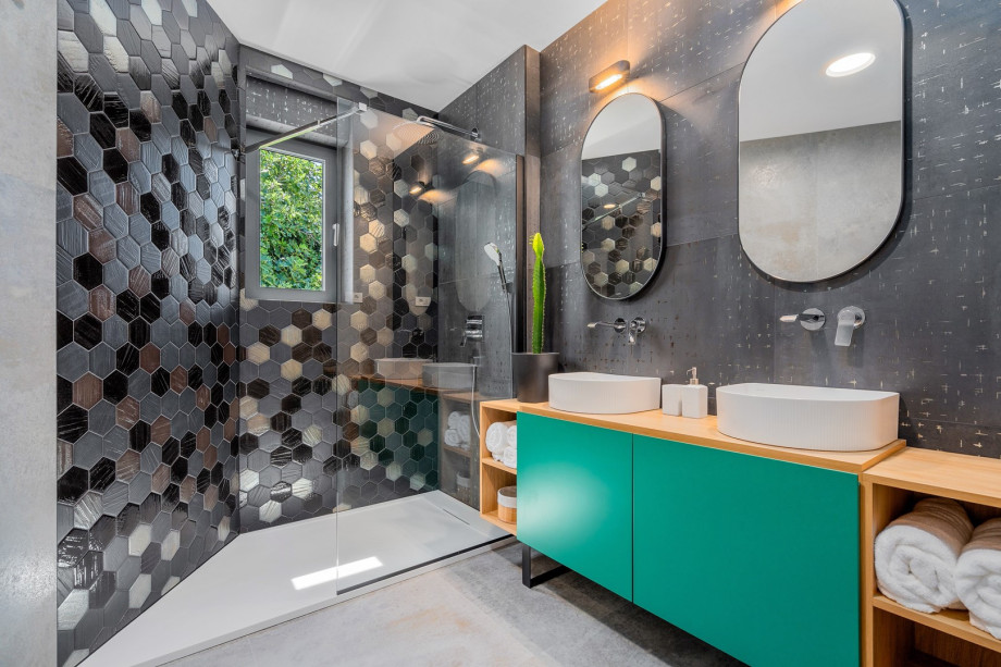 A Family Bathroom with a shower on the first floor