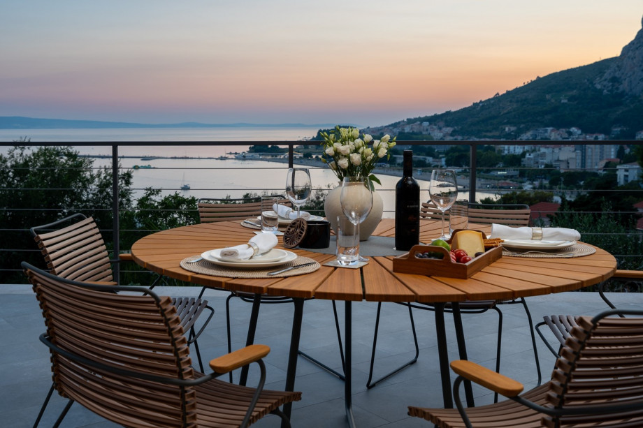 outdoor dining area with sea view