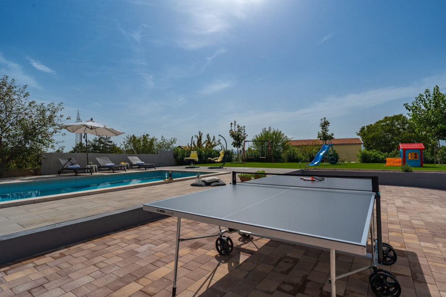 Pool area with table tennis
