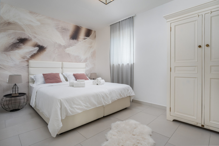 Bedroom No.1 on the ground floor with two single beds 90x200cm,  AC, TV