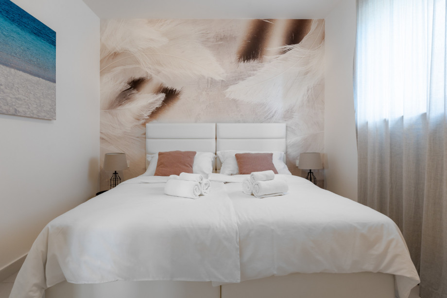 Bedroom No.1 on the ground floor with two single beds 90x200cm,  AC, TV