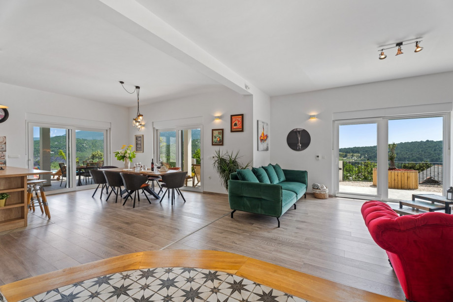 The Ground floor offers a huge living area with a TV