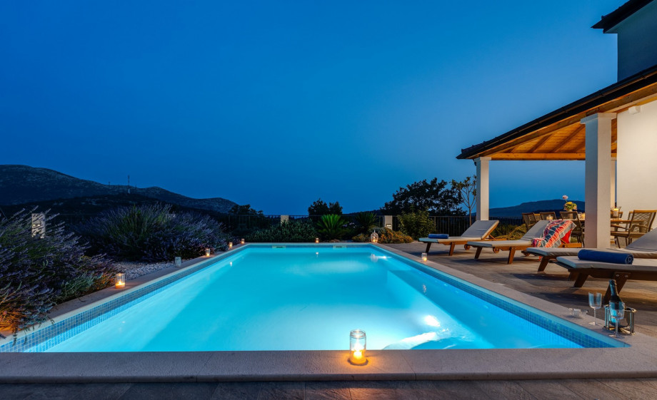 Heated pool with spacious sun deck