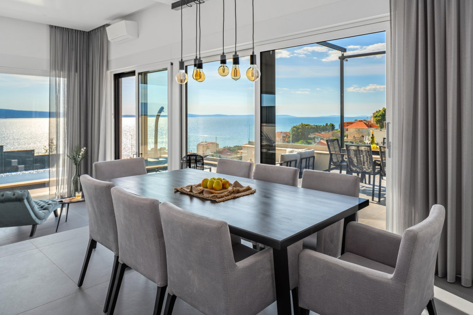 Spacious dining area for 8 pax filled with natural light