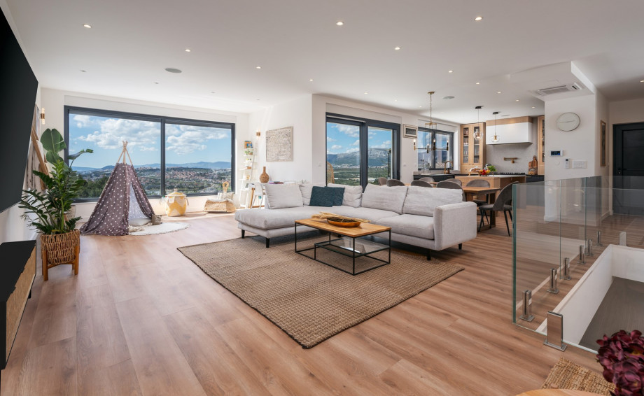 Living area with reading corner and a children corner with some toys and fun zone