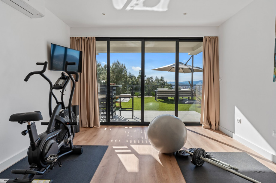 Gym area with a Finnish sauna