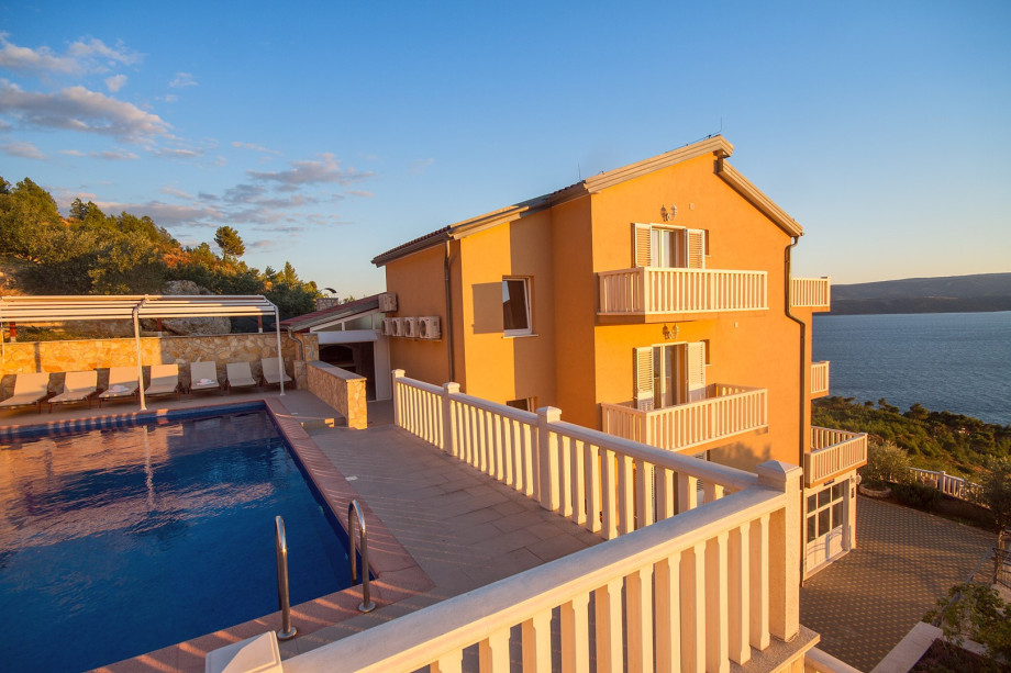 Villa Ana and pool area with 10 lounge chairs and shower