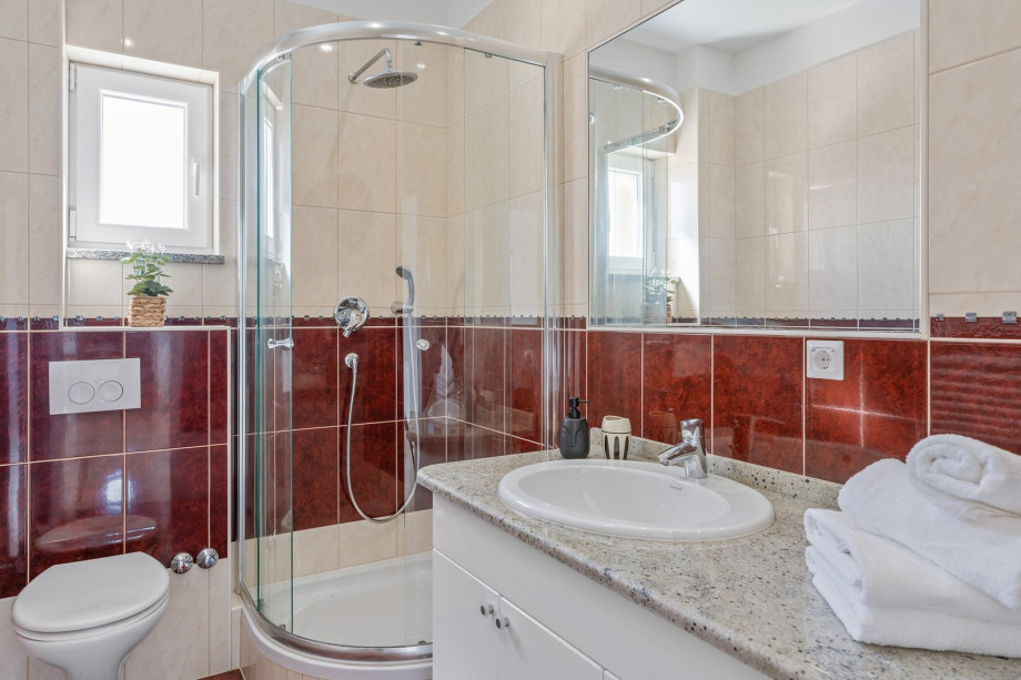 One of the 6 family bathrooms with a shower