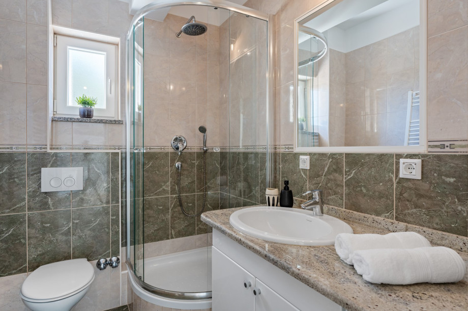 One of the 6 family bathrooms with a shower