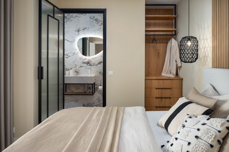 There is a Bedroom NO1 with a king-size bed 180x200, an en-suite bathroom with a shower