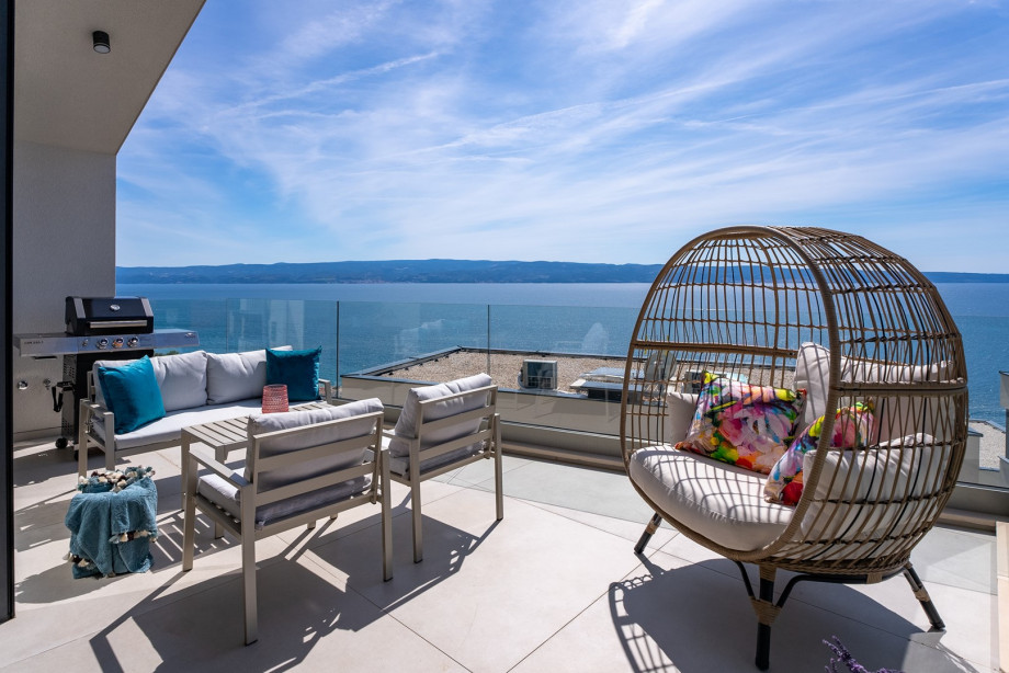 Terrace with a lounge area and BBQ