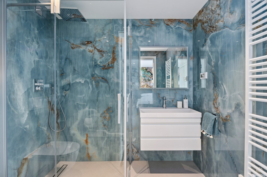 En-suite bathroom with a shower, towels are provided