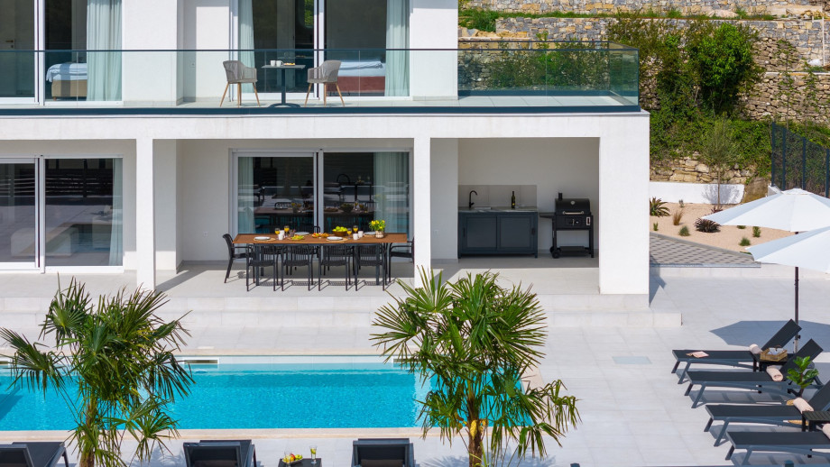 a large 47 m2 (10.5 m x 4.5 m) sparkling private pool with a ten loungers