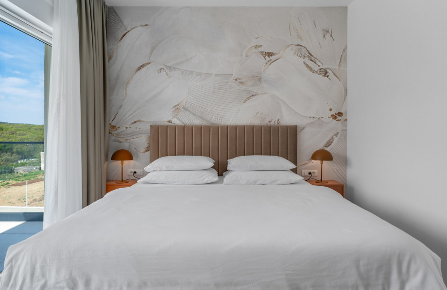 The Bedroom NO5 with a king size bed, A/C, a TV, an en-suite bathroom with a shower, and a terrace overlooking the pool and natural surroundings