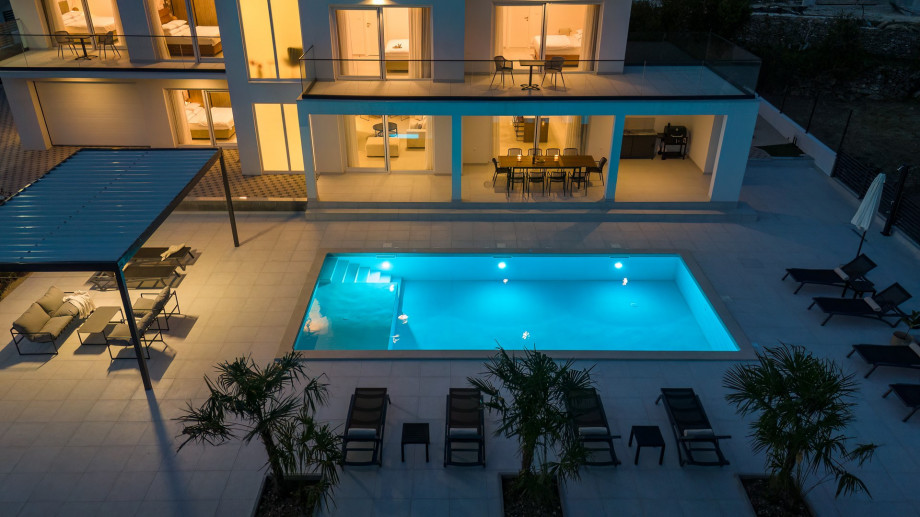 night view of the villa and the pool area