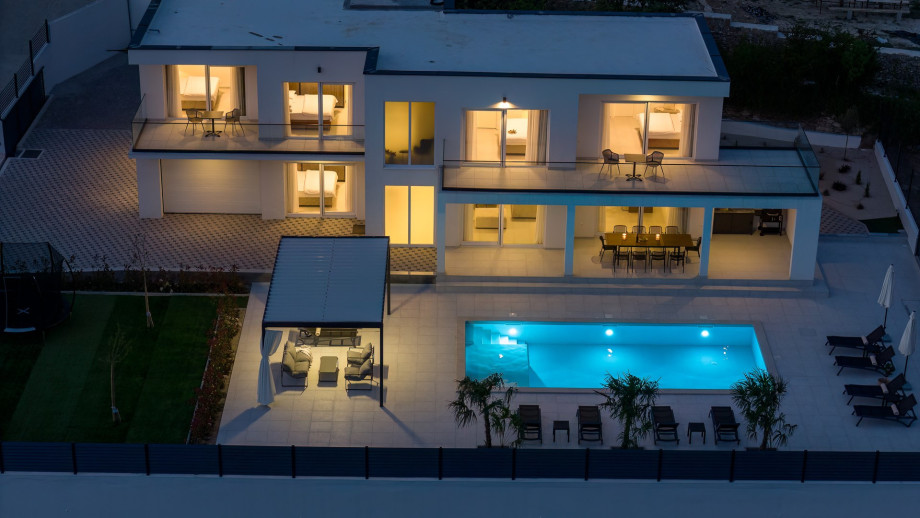 Villa Carmen with 5 en-suite bedrooms, at night