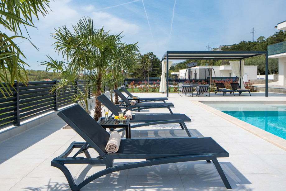 ten loungers on the inviting sun deck