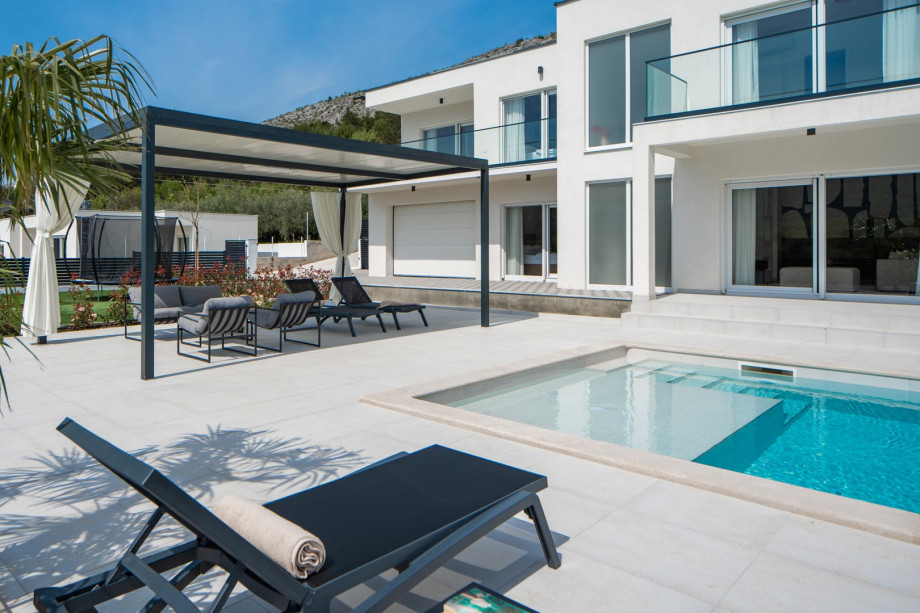 ten loungers on the inviting sun deck