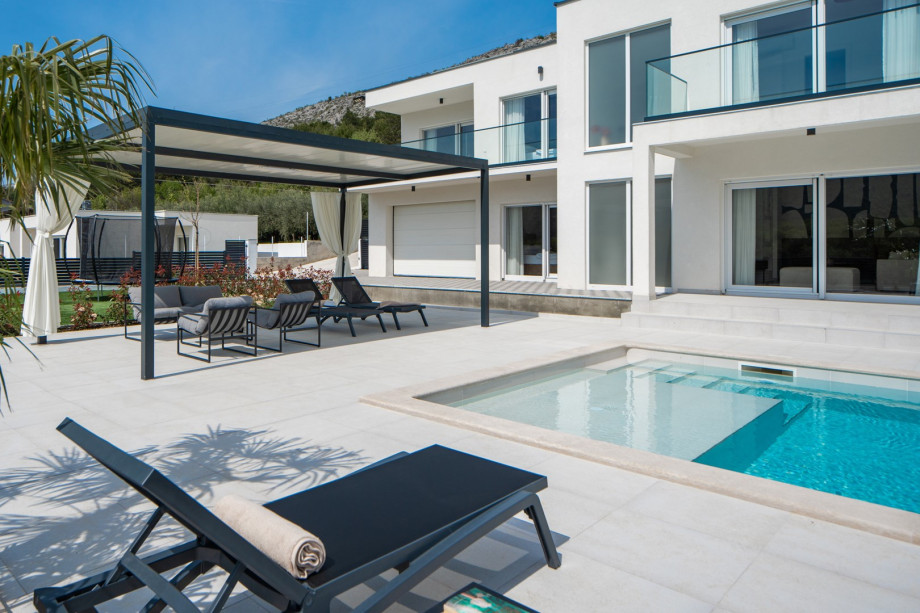 ten loungers on the inviting sun deck