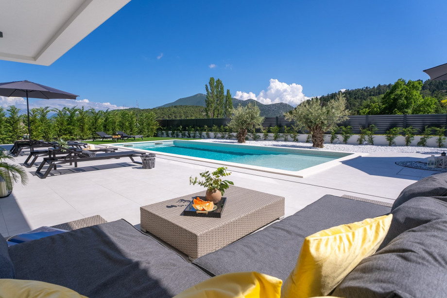 perfect place to unwind in the swing chair, lounge in the corner, and enjoy the sun