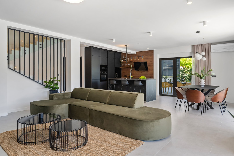 stylish living room with a sofa and TV