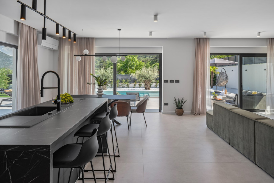 a fully furnished kitchen with an island