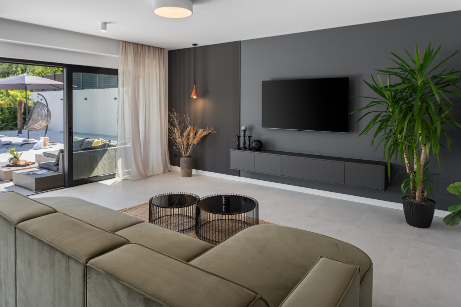 stylish living room with a sofa and TV